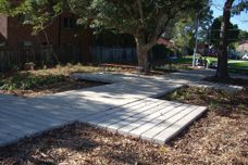 Concrete boardwalk protects urban park
