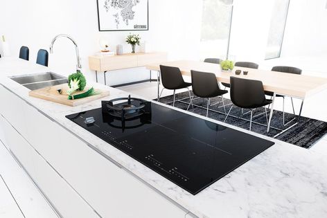 Asko’s Duo Fusion cooktop features a Fusion Volcano Wok burner and four induction zones.