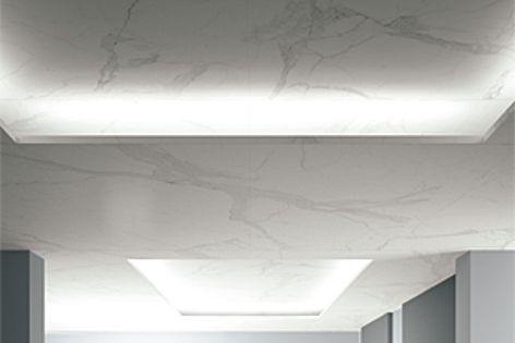 Maximum Calacatta 3-mm-thick porcelain, used in a ceiling installation.