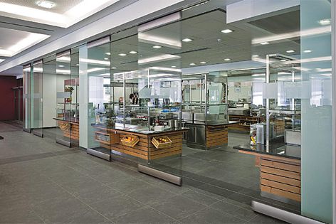 The HSW-EM automated glass wall solution gives commercial environments greater flexibility.