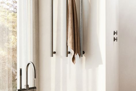 Phoenix Tapware’s IPX5-rated heated towel rails are hardwired to ensure a streamlined look.